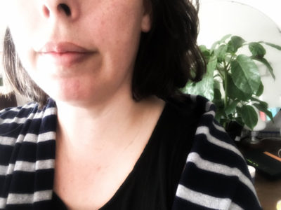 self portrait for mental health recovery blog - image shows mouth and nowe with plant in background